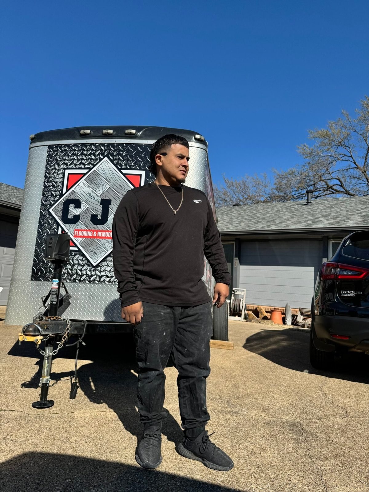 Enrique with the CJJ Remodeling trailer